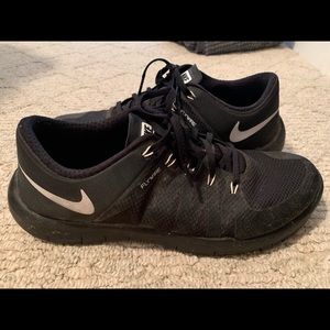 Black Nike athletic shoes size 11